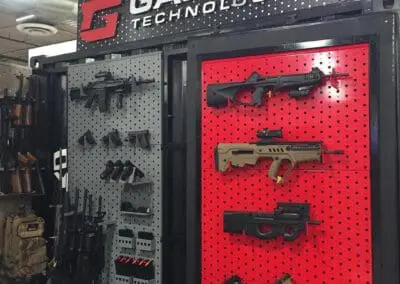 Black powder-coated metal components arranged for a Gallow Technologies production project.